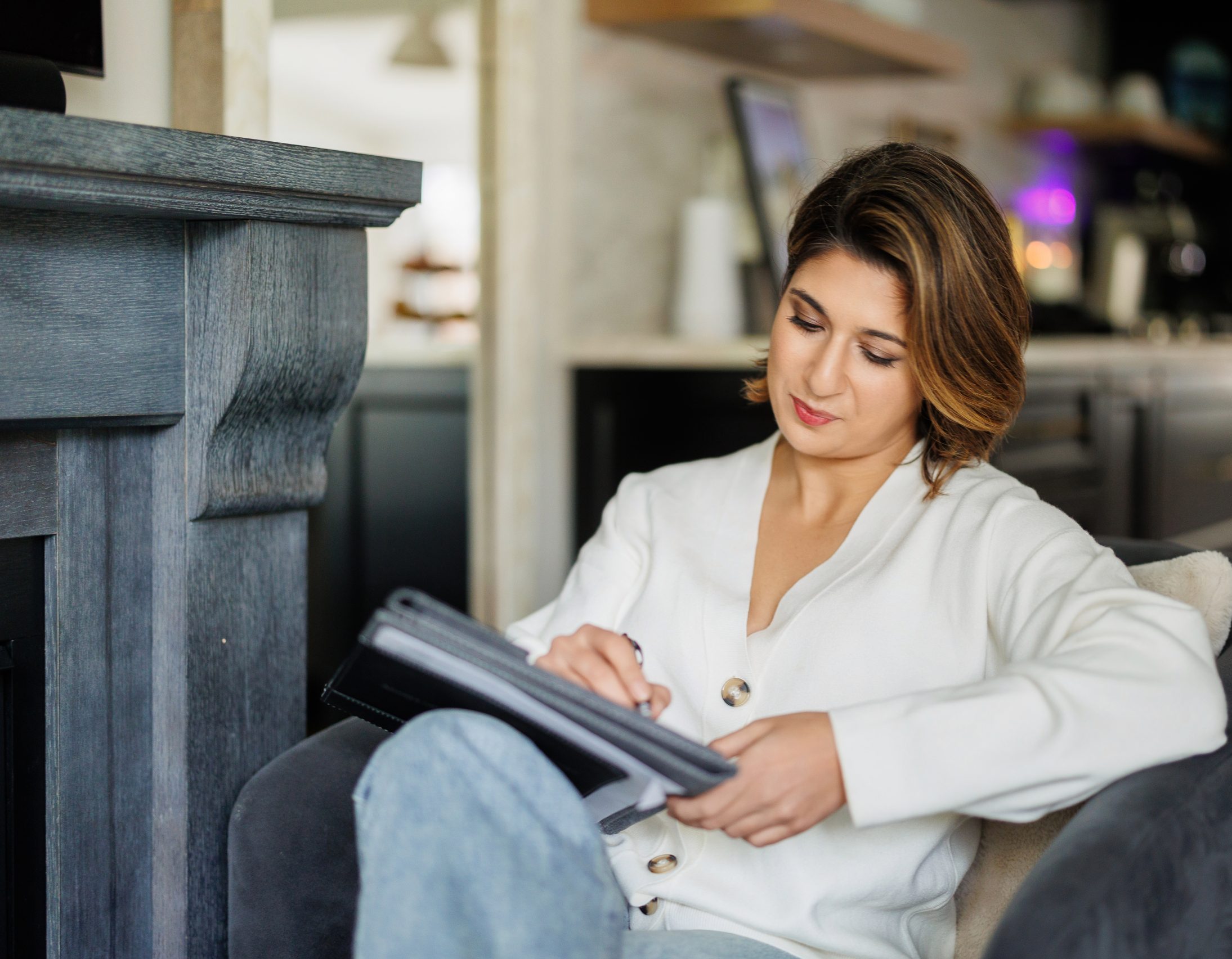 Anastasia Sfiroudis, an accomplished and compassionate psychotherapist, revels in her work as she situates herself in an armchair to prepare for a client session.